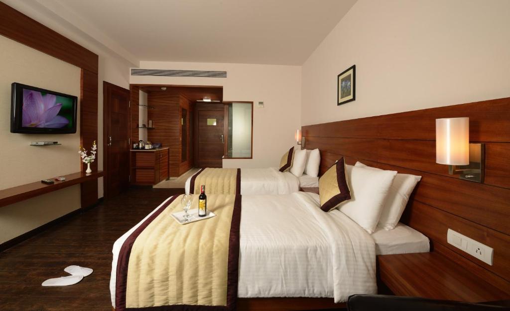 Hotel Sandy'S Tower Bhubaneswar Quarto foto